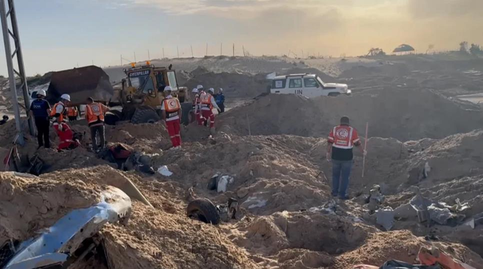 Новини світу - У Газі в "братській могилі" знайшли тіла 14 зниклих гумпрацівників